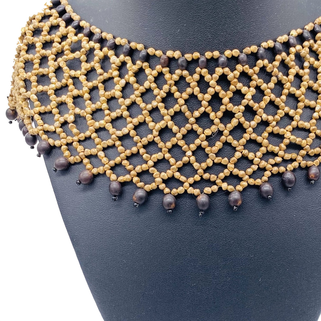 Woven pattern seed necklace accented with black seed beads