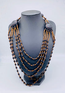 Layered black seed long necklace