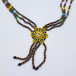 Long rainbow seed and bead necklace