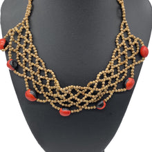 Load image into Gallery viewer, Braided seed necklace with accent red seeds
