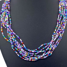 Load image into Gallery viewer, Multi colored beaded strands necklaces and delightful shorter flower necklaces
