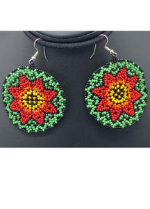Yellow and orange Cosmic flower with green background earrings