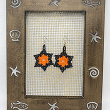 Load image into Gallery viewer, Hanging Black and orange star earrings
