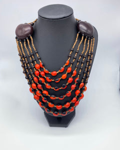 Six strand black and red seed necklace