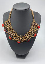 Load image into Gallery viewer, Braided seed necklace with accent red seeds
