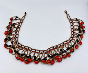Elaborate red and black seed necklace