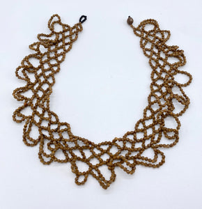 Elegant knotted seed necklace
