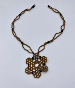 Geometric black accented seed necklace