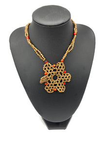 Geometric red flower seed necklace