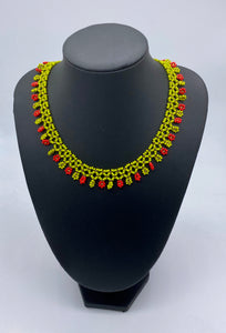 Multi colored beaded strands necklaces and delightful shorter flower necklaces
