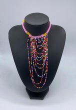 Load image into Gallery viewer, Multi colored beaded strands necklaces and delightful shorter flower necklaces
