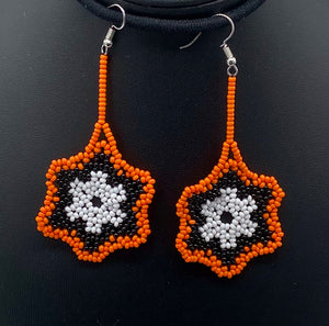Perfect for halloween or your favorite sports fan. Simple orange, black and white center