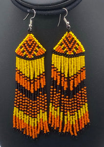 Large yellow, orange and black medusa earrings