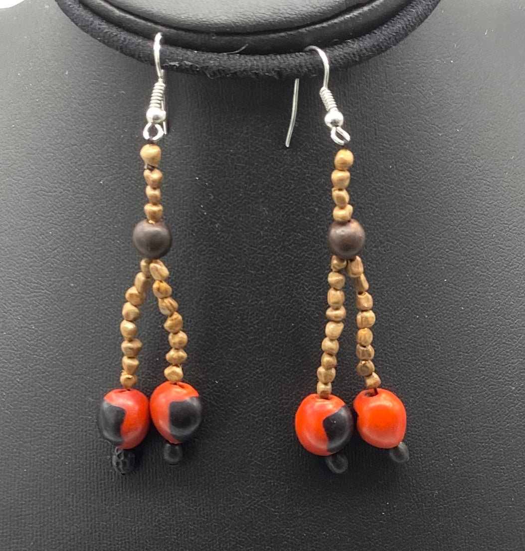 Two red and black seed dangle