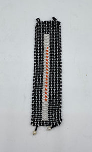 White rectangle with orange beads with surrounding color