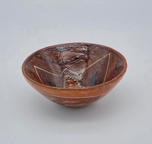 Converging lines pottery bowl