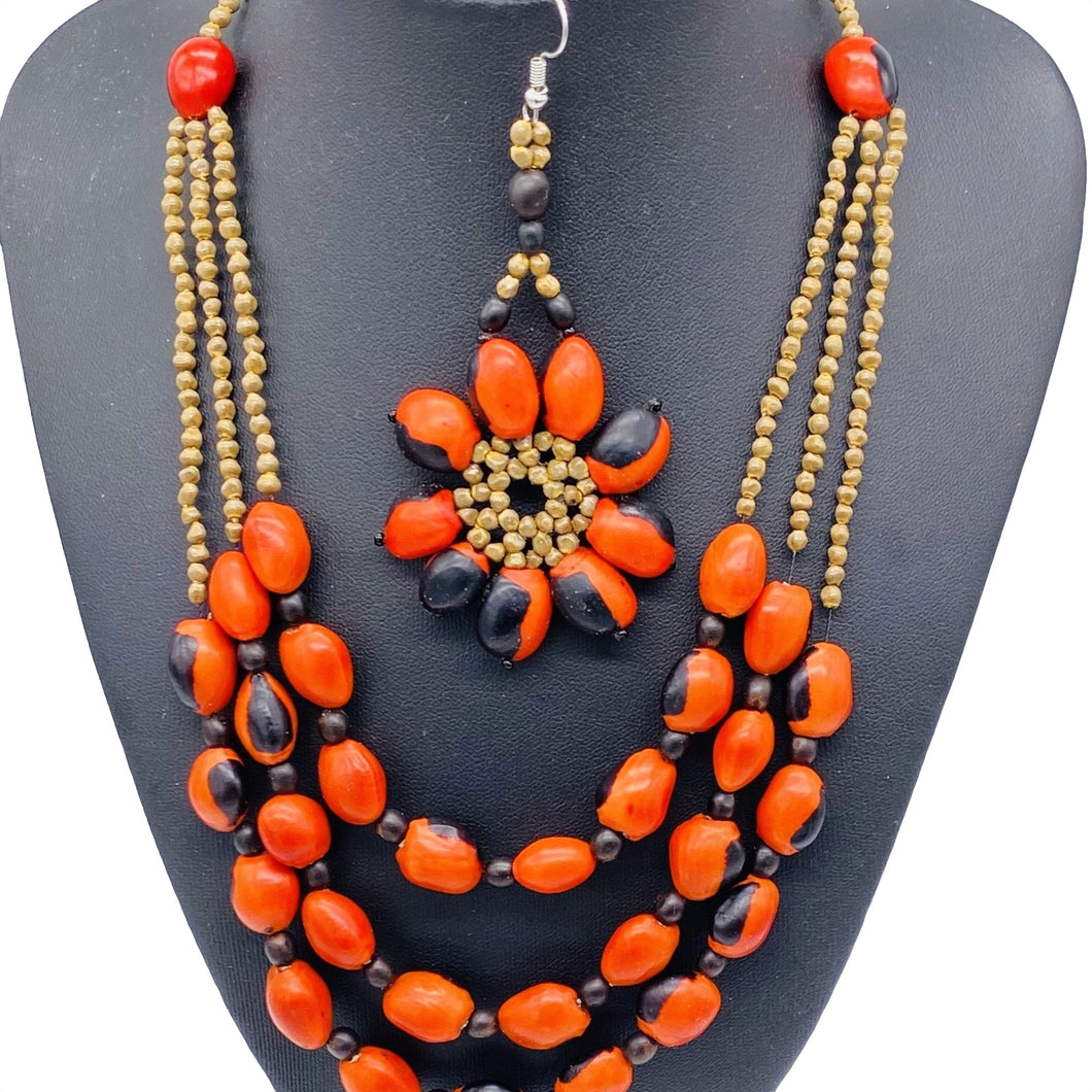 Stunning multi strand red seed necklace with matching earrings
